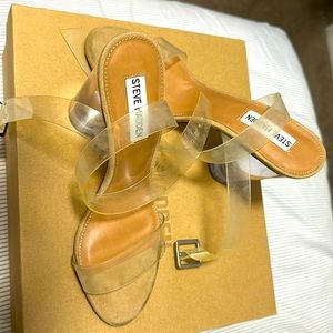 Steve Madden heels, clear with tan bottoms. In good condition